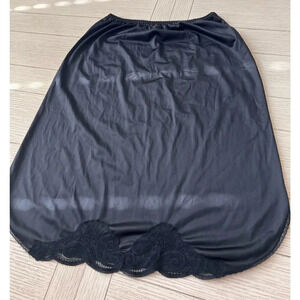 US made vintage poly black lace slip. Sz S 34-37 as indicated on tag.Knee length